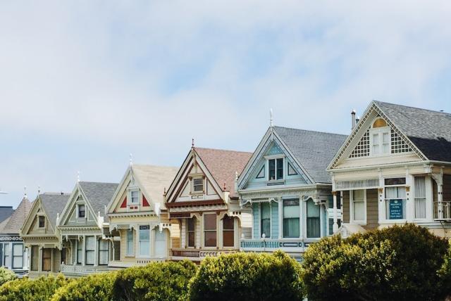 Row of homes with hedge in front (Photo credit: Jessica Bryant)