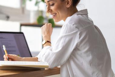 People looking at laptop