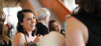 A woman smiling at the UBC nursing gala
